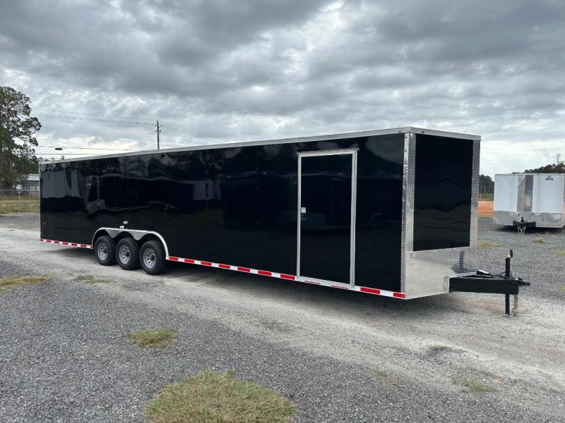 8.5x34-TTA-NC-1 8.5x34 Triple Axle Rolling Vault Premium Car Hauler Trailer